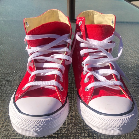 Red Converse high top shoe. Mens 9 Women 11. Brand New with tags